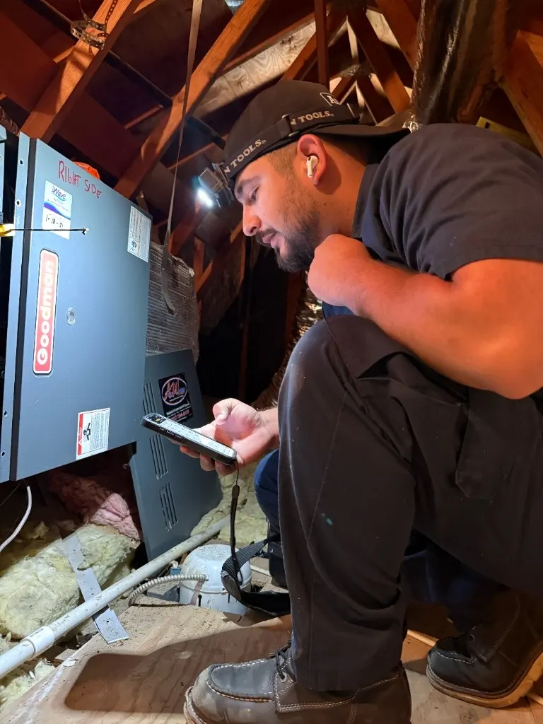 AirWorks technician diagnosing a residential furnace